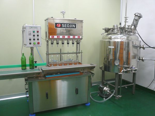 Fluid bottle filling line 